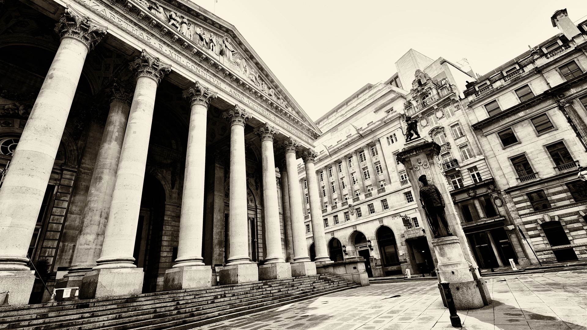 Black and white photo of the London Stock Exchange building. 